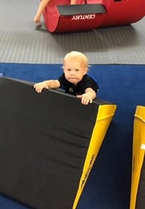 Young child on Slanted Step.